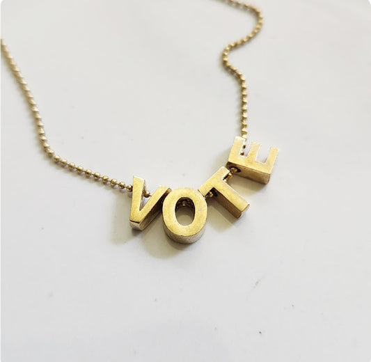 Block Letter Vote Beaded Necklace in Brass with Ball Chain