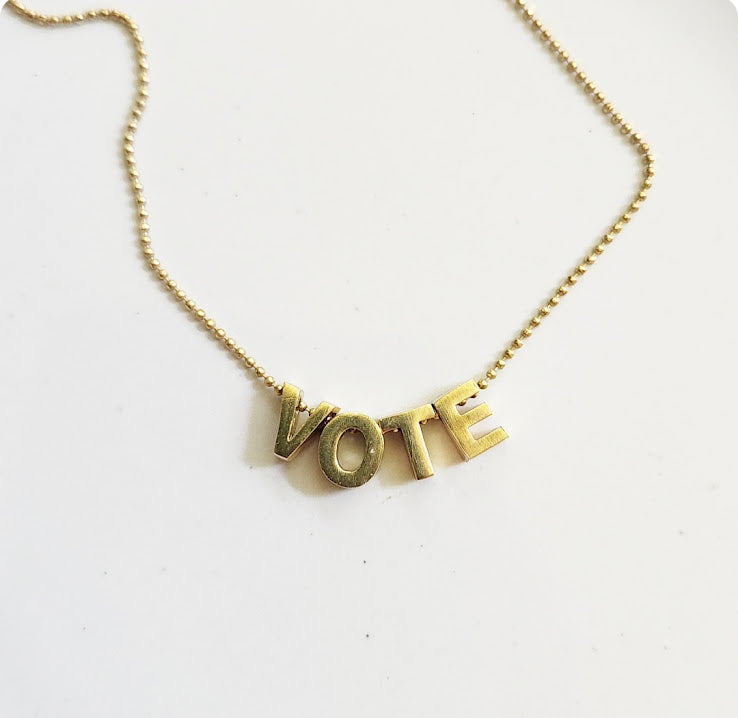 Block Letter Vote Beaded Necklace in Brass with Ball Chain