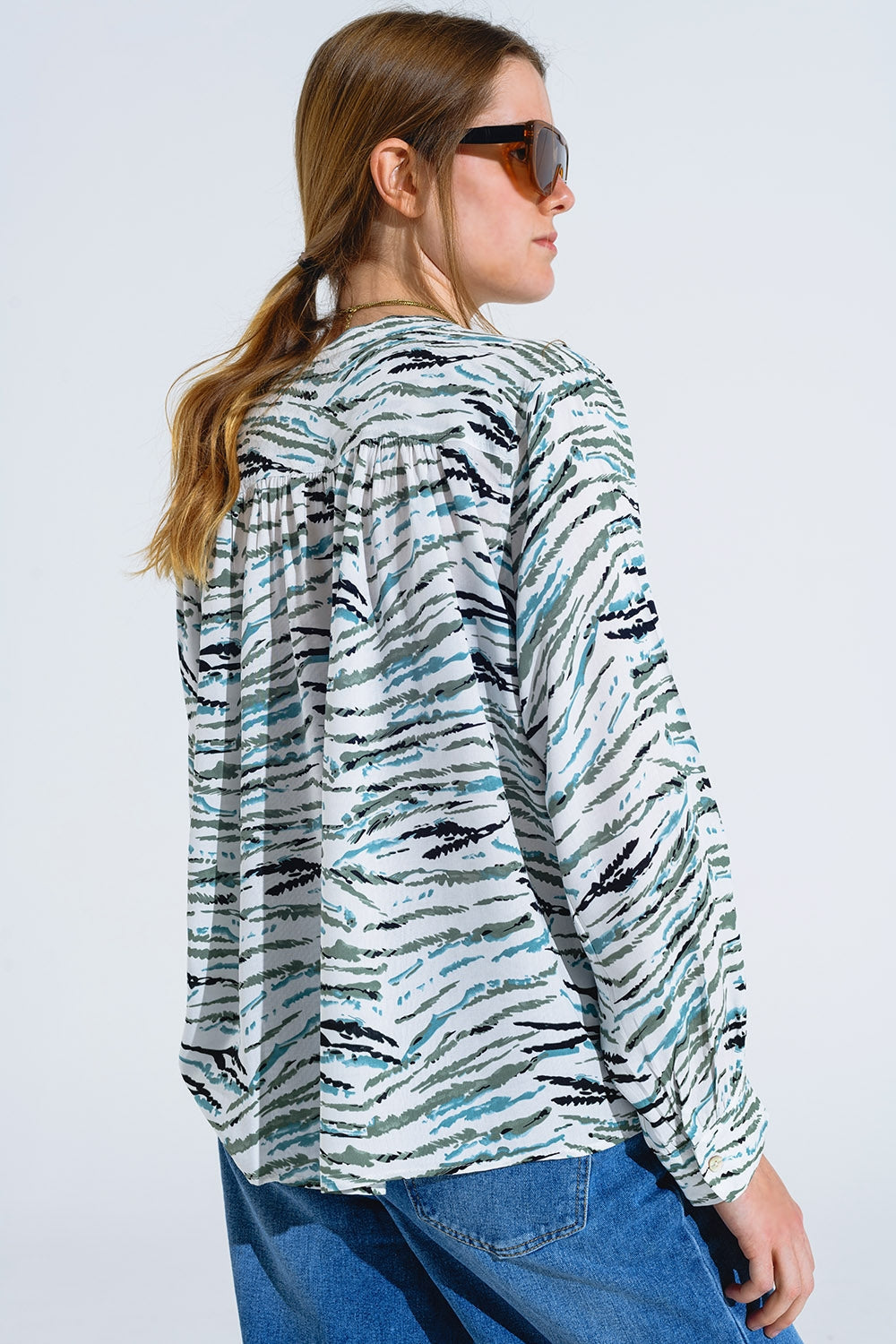 White Blouse With Green Animal Print and Long Sleeves
